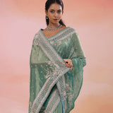 Green Georgette Tissue Saree With Fancy Border