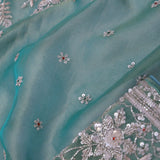 Green Georgette Tissue Saree With Fancy Border