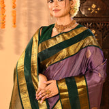 Classic Lavender And Emerald Green With Checks And Butti On Kanjivaram Silk Saree
