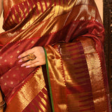 Maroon Kanjivaram Silk Saree With Wide Gold Zari Temple Border