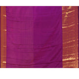Vibrant Orange With Zari Checks And Purple Border On Kanchipuram Silk Saree