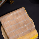 Beige Tissue  Embroidery Saree With Woven Stripes And Yellow Satin Border