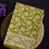 Parrot Green Kanjivaram Silk Saree With Sunflower Vine Weave And Beige Contrast Border