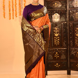 Apricot Orange Kanjivaram Silk Saree With Purple Contrast Zari Border