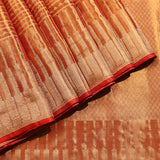 Radiant Orange And Gold Kanjivaram Silk Saree With Geometric Weaving