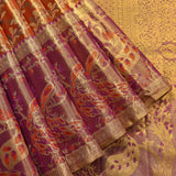 Captivating Rust Orange And Purple Kanjivaram Silk Saree With Peacock And Vine Motifs