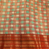 White And Teal Multicolour Checks Pure Silk Kanjivaram Saree With Contrast Red Heavy Woven Border
