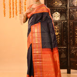 Navy Blue Kanjivaram Silk Saree With Contrast Orange Zari Striped Border