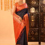 Navy Blue Kanjivaram Silk Saree With Contrast Orange Zari Striped Border