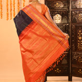 Navy Blue Kanjivaram Silk Saree With Contrast Orange Zari Striped Border