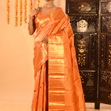 Vibrant Orange With Colourful Buttis And Broad Gold Zari Border In Kanjivaram Silk Saree