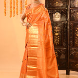 Vibrant Orange With Colourful Buttis And Broad Gold Zari Border In Kanjivaram Silk Saree