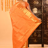 Vibrant Orange With Colourful Buttis And Broad Gold Zari Border In Kanjivaram Silk Saree