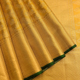 Opulent Golden-Yellow Traditional Silk Saree With Green Edge Detail