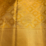 Opulent Golden-Yellow Traditional Silk Saree With Green Edge Detail