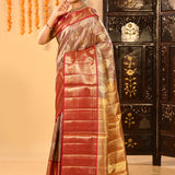 Elegant Metallic Red And Gold Kanjivaram Silk Saree With Woven Borders