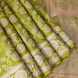 Parrot Green Kanjivaram Silk Saree With Sunflower Vine Weave And Beige Contrast Border