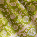 Parrot Green Kanjivaram Silk Saree With Sunflower Vine Weave And Beige Contrast Border