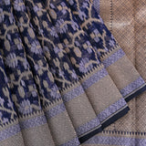 Navy Blue Banarasi Saree With Ikat-Style Geometric Weave & Floral Lattice Border
