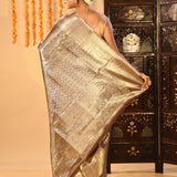 Sophisticated Metallic Mauve-Brown Kanjivaram Silk Saree With Circular Butti Motifs