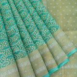 Sea Green Kanjivaram Silk Saree With Scattered Zari Butis And Geometric Gold Border