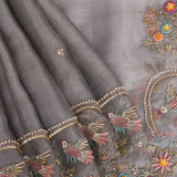 Grey Organza Saree With Hand Embroidered Bird And Floral Border