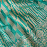 Turquoise Green Banarasi Silk Saree With Diamond Stripe Weave & Floral Border