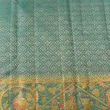 Vibrant Coral-Red Silk Saree With Contrast Teal Peacock Border
