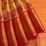 Gold Tissue Kanjivaram Silk Saree With Large Floral Body And Magenta Border
