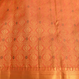 Burnt Orange Kanjivaram Silk Saree With Self Tone Gold Zari Butti And Floral Weave