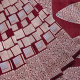 Maroon Banarasi Silk Saree With Checkerboard Weave And Leaf Pallu