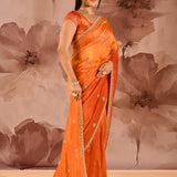 Rust Orange With Sequin Tassel Motif Border Satin Silk Saree