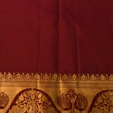 Deep Maroon Kanjivaram Silk Saree With Gold Zari Shikargah Floral Jaal And Grand Peacock Arch Border Weave
