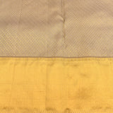 Silver Grey Kanjivaram Silk Saree With Self Tone Gold Zari Floral Weave And Contrast Orange Gold Jaal Border