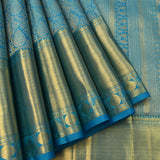 Cerulean Blue Kanjivaram Silk Saree With Gold Zari All Over Floral Jaal And Self Border With Medallion Weave