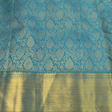 Cerulean Blue Kanjivaram Silk Saree With Gold Zari All Over Floral Jaal And Self Border With Medallion Weave