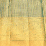 Dusty Mauve & Gold Kanjivaram Silk Saree With Multicolour Floral Tree Buttas & Teal Gold Zari Pallu