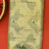 Striking Forest Green And Coral Pink Kanjivaram Silk Saree With Peacock Motifs