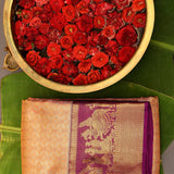Orange Kanjivaram Silk Saree With Purple Pictorial Zari Border