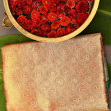 Rust Orange Kanjivaram Silk Saree With Green Border And Gold Zari Lotus Weave