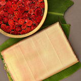 Elegant Peach And Green Kanjivaram Silk Saree With Gold Zari Peacock Motifs