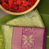 Green Kanjivaram Silk Saree With Purple Lotus Motif Border