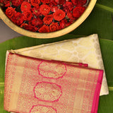 Timeless Cream And Rani Pink Kanjivaram Silk Saree With Gold Zari Motifs
