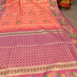 Kanjivaram Silk Saree In Orange Red With Elephant Shikargah And Contrast Purple Multicolour Paisley Border