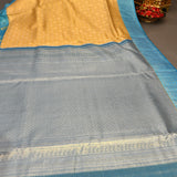 Mustard Yellow Kanjivaram Silk Saree With Teal Border And Multicolour Floral Weave