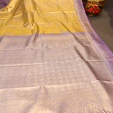 Yellow Kanjivaram Silk Saree With Mustard Pallu And Purple Peacock Zari Border