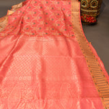 Kanjivaram Silk Saree In Coral Red With Multicolour Floral Buttas And Contrast Antique Gold Medallion Border
