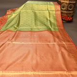 Pastel Green Kanjivaram Silk Saree With Red Lotus Motif Border