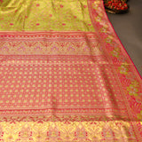Lime Green Kanjivaram Silk Saree With Rani Pink Floral Border