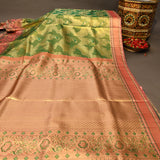 Striking Forest Green And Coral Pink Kanjivaram Silk Saree With Peacock Motifs